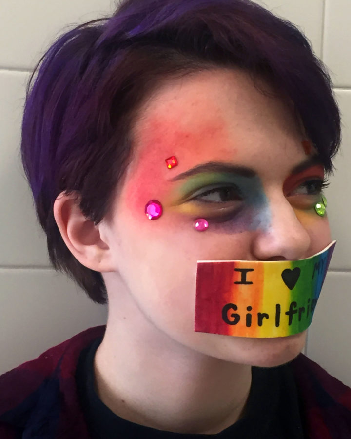 Sophomore Abby Maloid, shows off her rainbow makeup.