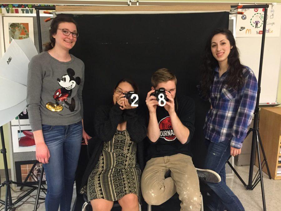 Photography seniors (from left to right) Megan Leyh, Lily Rosas, Brennan Nolan, and Gine DeFrancisci celebrate 28 days left of high school.
