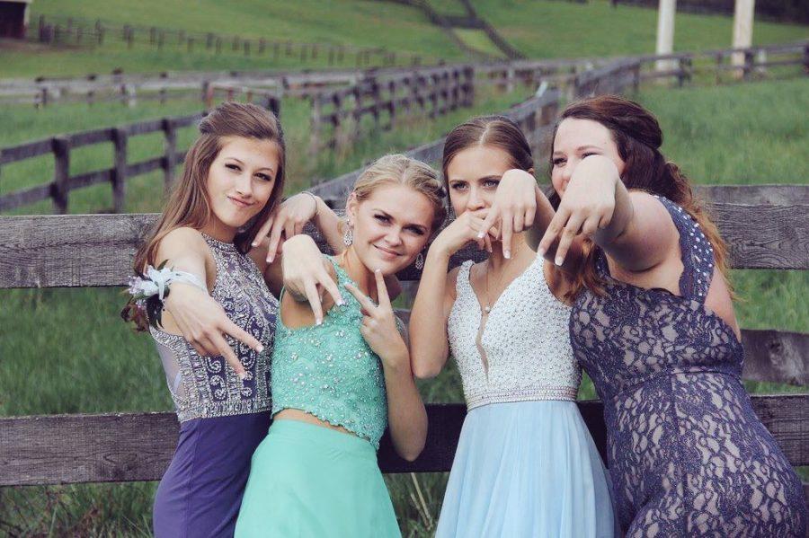 (from left to right) Juniors Rachel Skowron, Carli Legambi, Taylor Rutley, and Cammi Ledford are all fun and games before prom