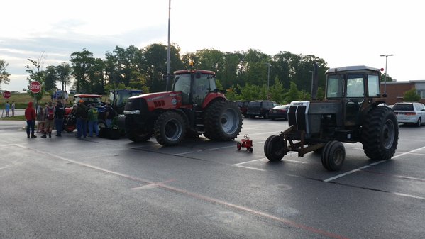 Tractors gathered before the seniors last day.