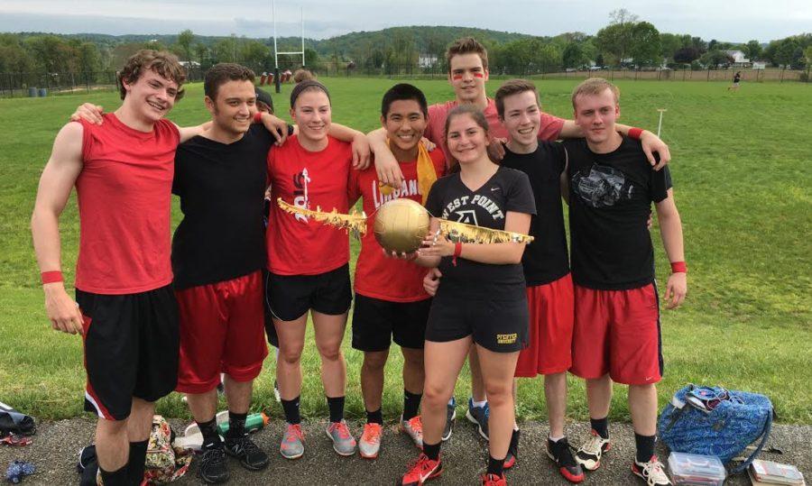 The winning Quidditch team, the Whimsical Wizards, holding their snitch trophy after a nail-biting tie breaker game. From left to right: seniors Andrew Brady, Emma Roerty, Luke Staley, Nathan Horch, junior, seniors Ben Plugge, and Jacob Moorman.