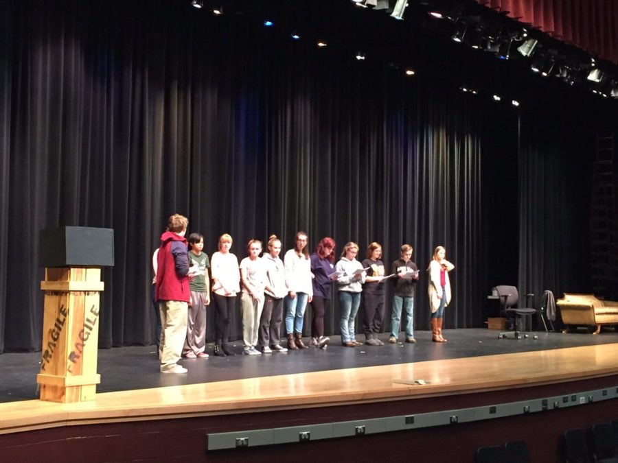 The cast of The Lottery rehearses on stage