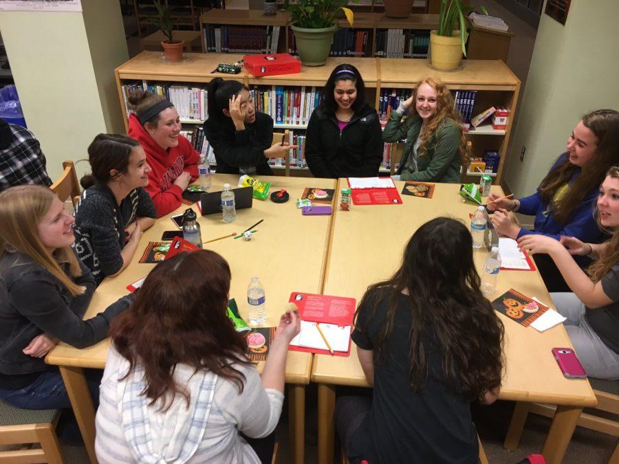 A group of Class of 2017 NEHS members enjoy a game of Scattergories. 