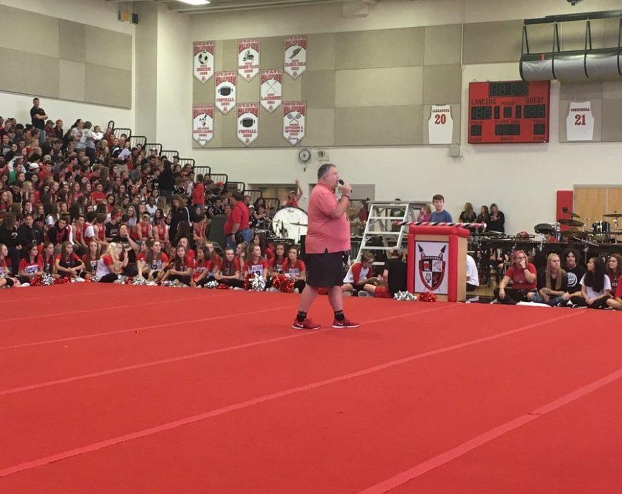 Mr. Jeremy Brown addresses the student body at the homecoming pep rally.