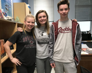 Juniors (from left to right) Kaycee Morris, Kelsey Ward and Sophomore Jacob Bolger show off their groufits.