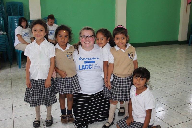 Claudia Bremer in Guatemala City, Guatemala, playing with children at Latin American Childcare schools.