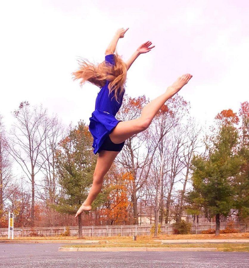 Kelly Stouffer performs aerial feats during her photo shoot. 