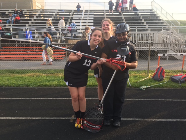 (Left to Right) Grace Weaver, Emily Daly, and Bre Wade after their Middletown game. 