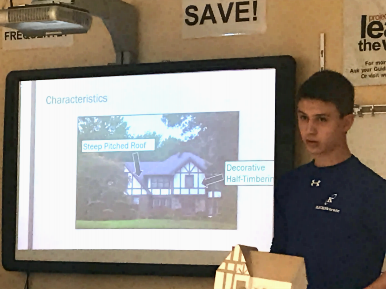 Joey Hall gives his presentation on Tudor style houses