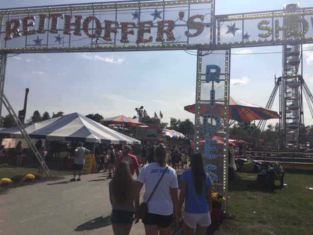 Members of the Class of 2018 Jordan Nicolet, Maggie Keaton, and Jessica Mitchell enjoy their last Fair Day.