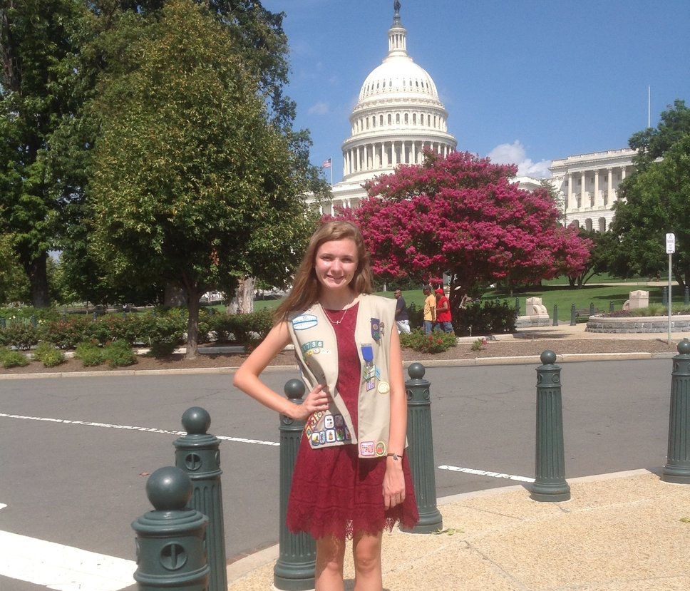Kelsey Ward stands in front of The Capitol building.