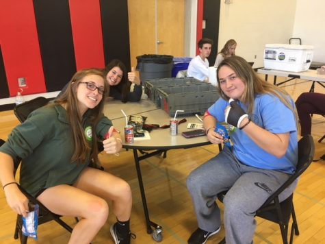 Rachel Freeman, Emily Wolfe, and Cailey Weber relax at the blood drive canteen.