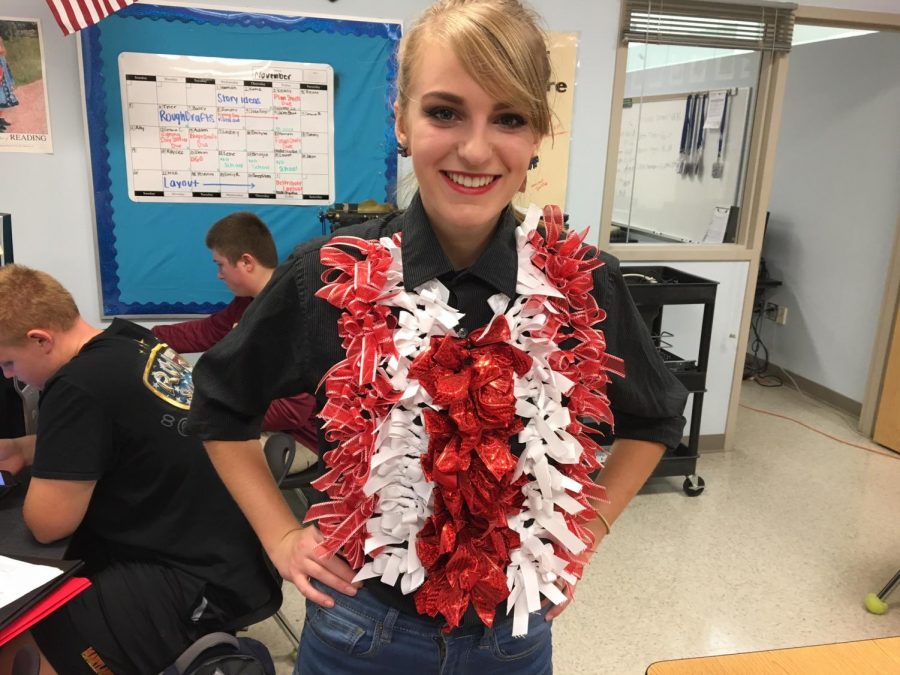 Samantha Buntman decked out in bows to give her class an advantage on Red Black and Bow Day.