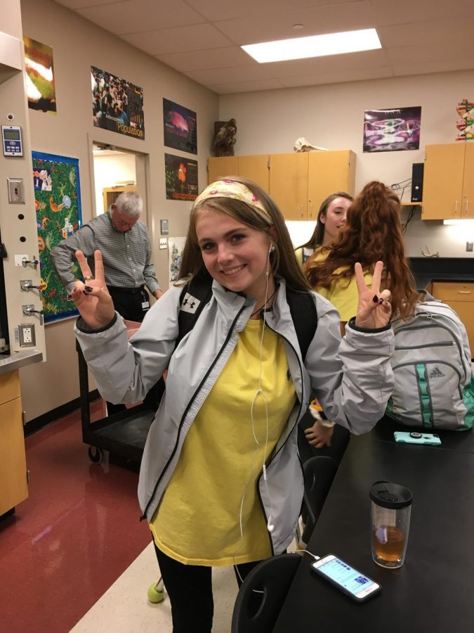 Payton Smith represents her sophomore class on Class Color Day by dressing in yellow.