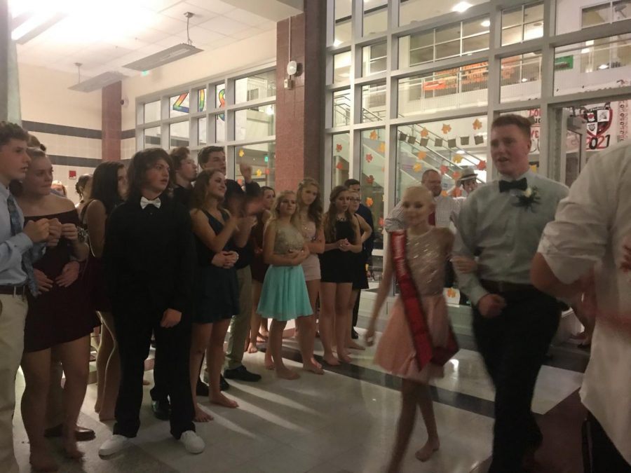 Prince Garrett Reese and Princess Lily Weaver of class of 2019 enter the dance.