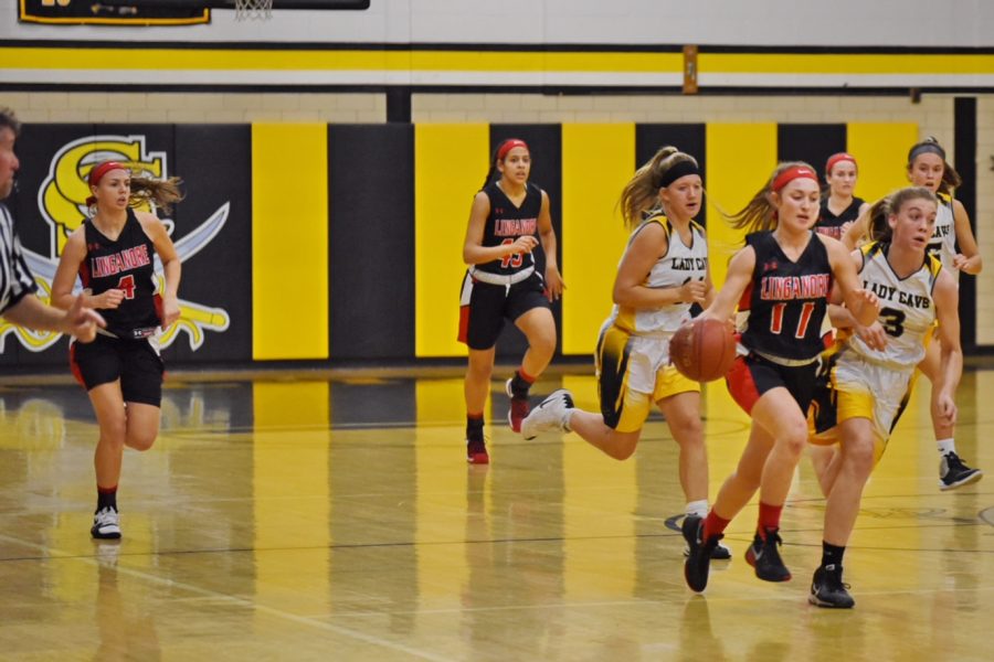 Sarah Twigg driving to the basket against South Carroll.