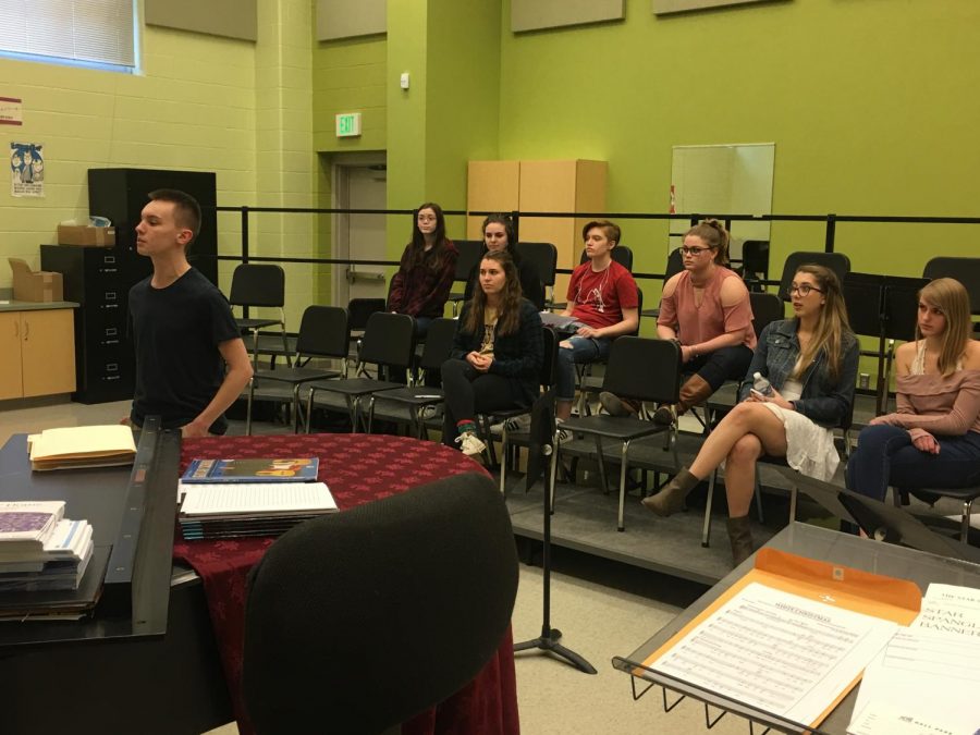 Jack Adams and his group work on the vocal audition.