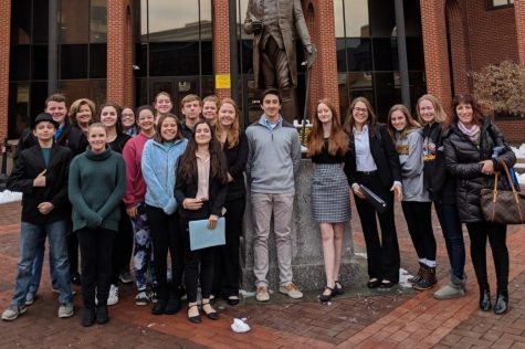 Mock trial team stands in front of the Frederick County Courthouse.