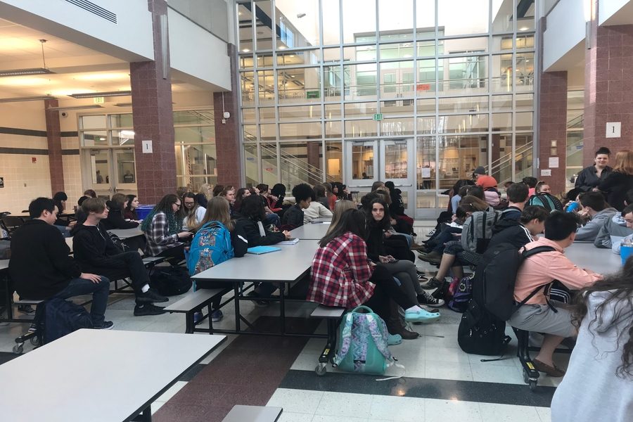 Students gather in a peaceful protest inside the cafeteria