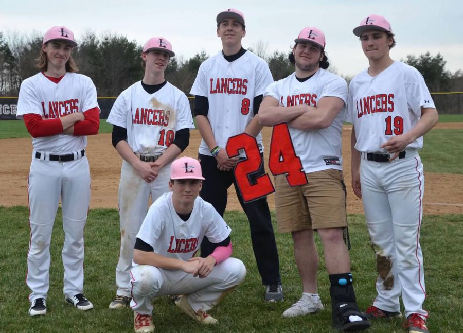 The+seniors+pose+after+winning+their+home+opener+against+South+Hagerstown