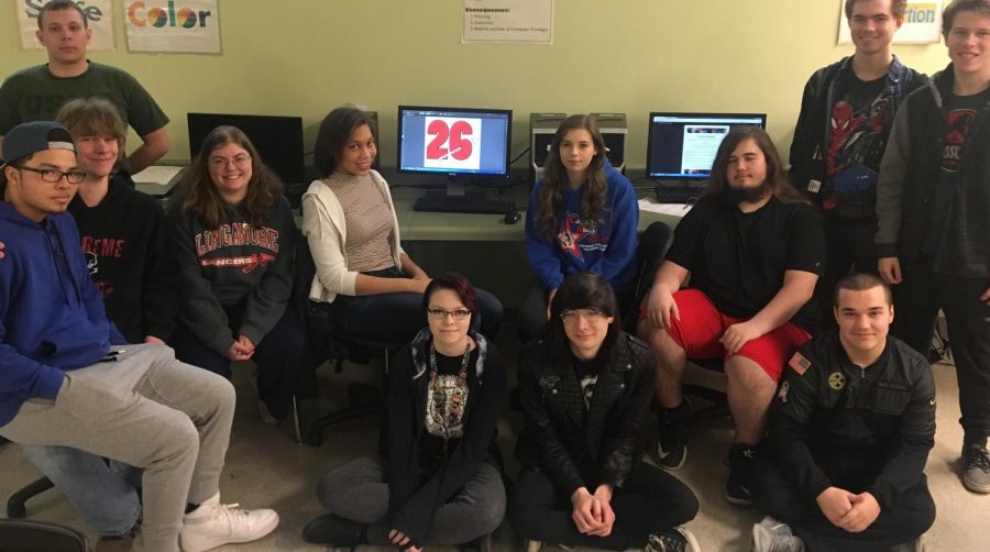 Computer graphics seniors pose in Mrs. Bozzonetti's class for day 26 of the senior countdown. 