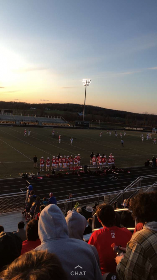 Varsity boys takes the field against Oakdale. 