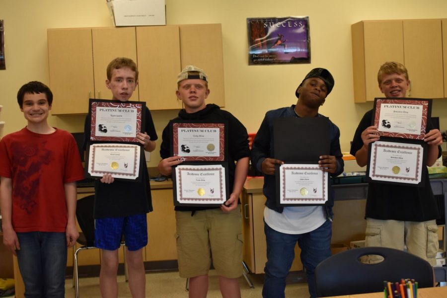 Learning for Life students celebrate winning academic awards. 