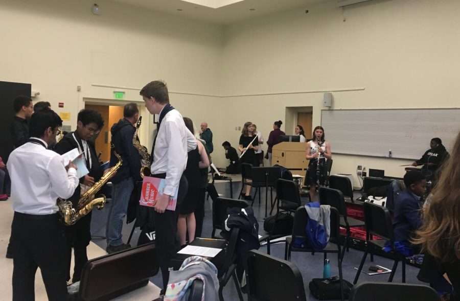 Students rehearse their pieces in the Towson warm up room before their performances. 