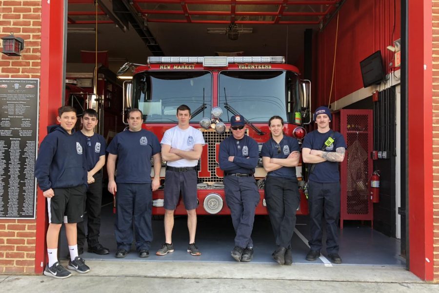 Monday night crew takes a picture together in front of the firehouse