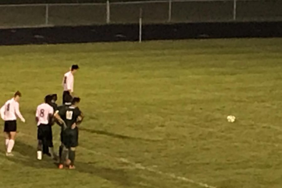 Centre-back Lukas Snyder lines up to take a penalty kick for the Lancers.