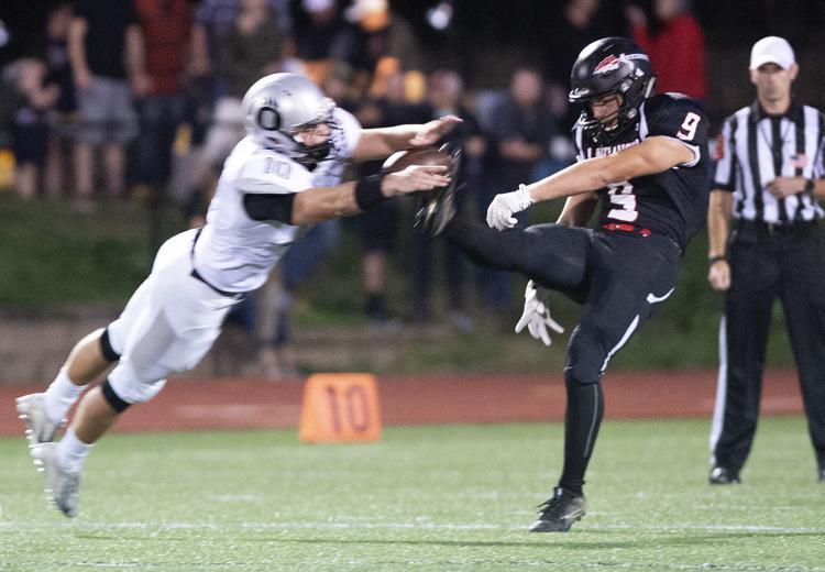 Luke Carey blocks punt by Mason Wills.