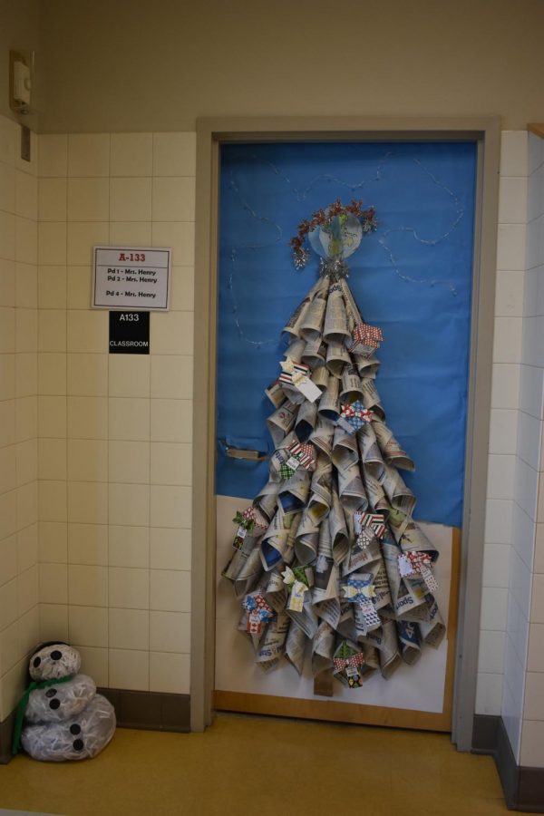 Ms. Henry won best traditional scene by using newspapers to make a tree.