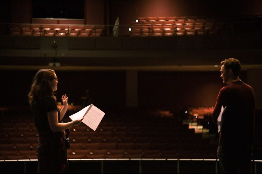Lincoln Robisch and his assistant director Laura Gede block out a scene on stage.