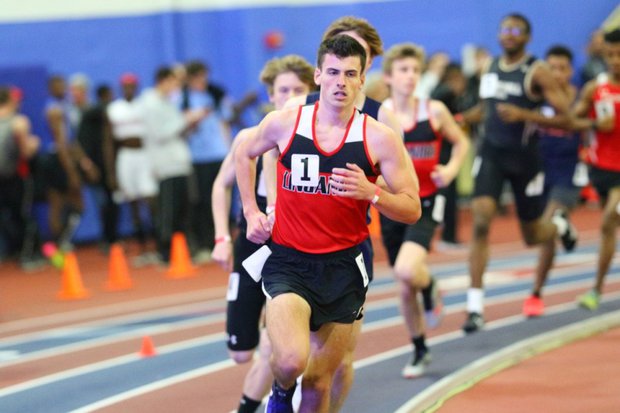 Michael Belmaggio leads the 3200 meter run.