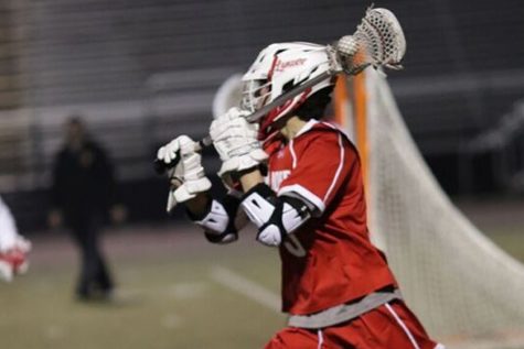 Roman Larocco, number 19 catches and starts to carry it down the field. 