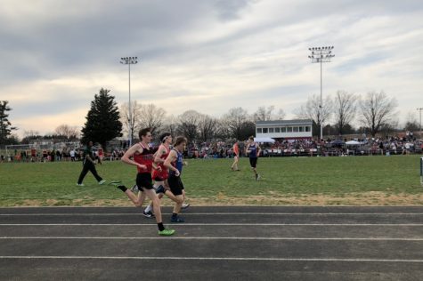 Ben Dill passes competition during the 800 meter race