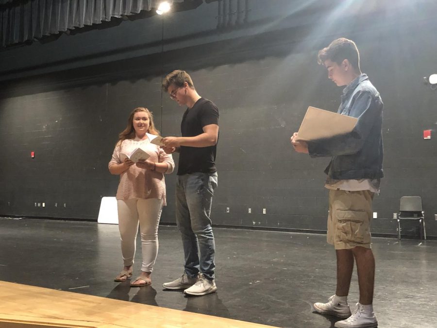 Student Director, Jacob Blue, gives directions to Emma Davis and David Kominars on a scene the pair are rehearsing.
