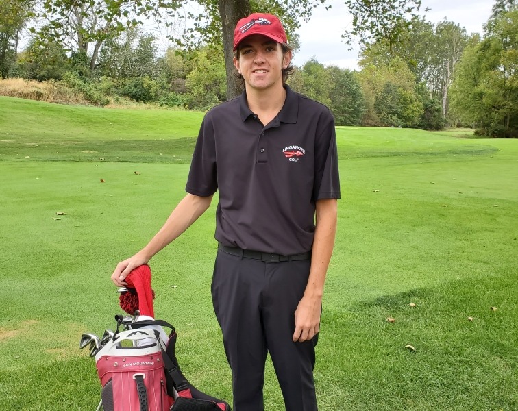 Vince Booth poses at a Golf tournament.