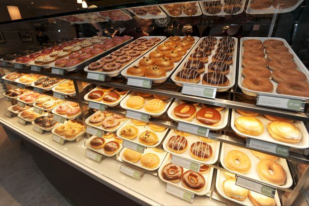 My mouth waters when I study a Krispy Kreme display case.  This one is in Frederick.