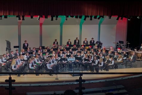 The Concert band prepares to play.