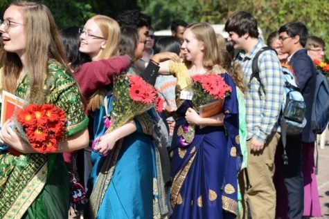 Leah Stucke (NY), Madeline Klein (NY), Elizabeth Anderson (MD), Zack Visker (NY), and Nito Slack (MD), say goodbye to youth at Apostles Methodist Church in Delhi, where they were given flowers and books as well as tea and snacks.