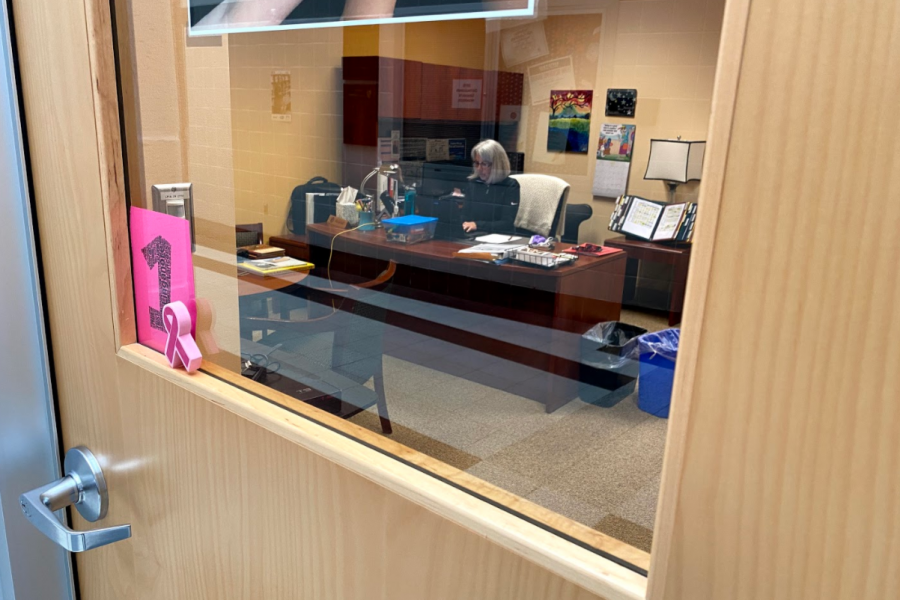 Principal Nancy Doll and her administrative team alternate working from home and in the school building. On May 7, she was returning phone calls, making plans for graduation, and greeting the few staff members who are allowed on the property. 