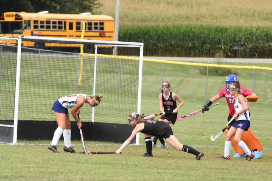 Rossman lunges across the field to save a goal against FSK.