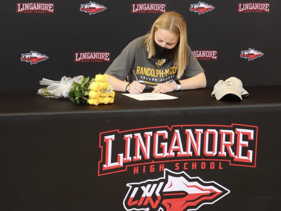 Sammie+Hoefs+signs+her+National+Letter+of+Intent+to+play+soccer+at+Randolph-Macon+College.