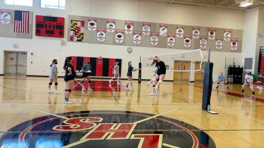 Junior varsity player, Katie Heely going in for the spike during practice. 