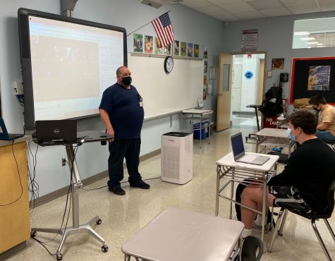 Mr. Mike Bowles speaking to Mrs. Rebetsky's journalism class.