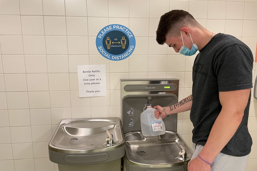 Senior, Gio Fuentes takes advantage of the newly installed water bottle stations.