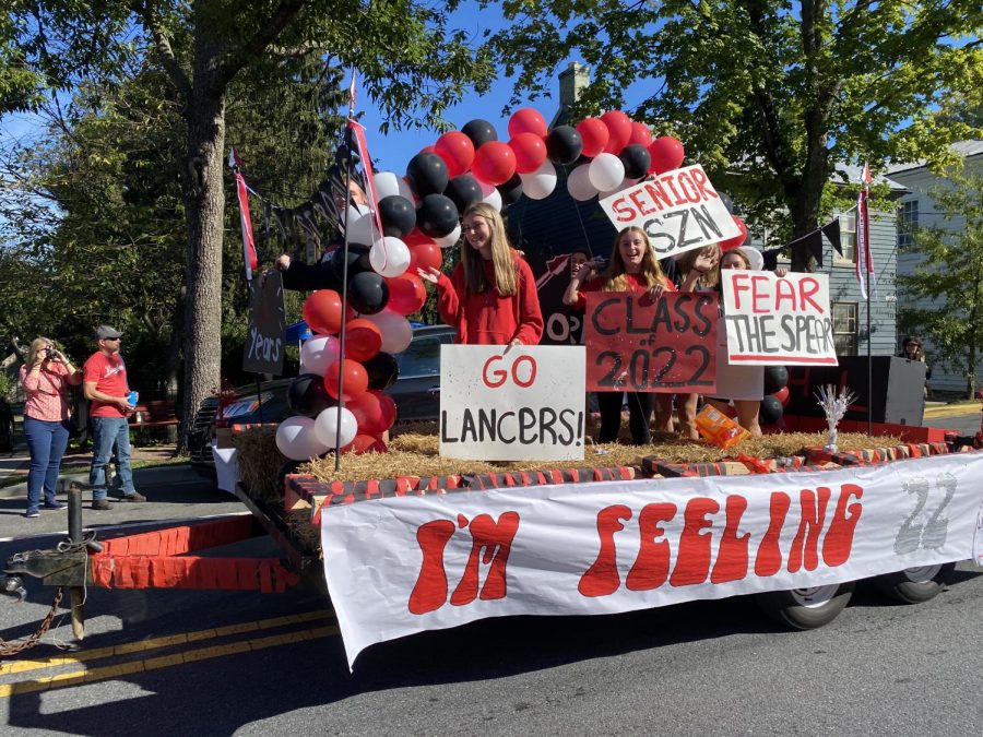 What comes to mind when you think of Homecoming? For the Linganore and New Market Community they think of long lasting traditions, memories and family. The Senior Class of 2022  is next to leave the Linganore nest. Waving to friends and family during their last Homecoming Parade, Ellie Breidenstein, Maeve Smarick and Emma Watkins find it all bittersweet, " I remember as a Freshmen everyone would tell us High School would fly by, I never believed them until now. Linganore will always hold a special place in my heart, it'll be hard to leave the day of Graduation but I know I will always have a home here and for that I'm grateful. " said Breidenstein. 