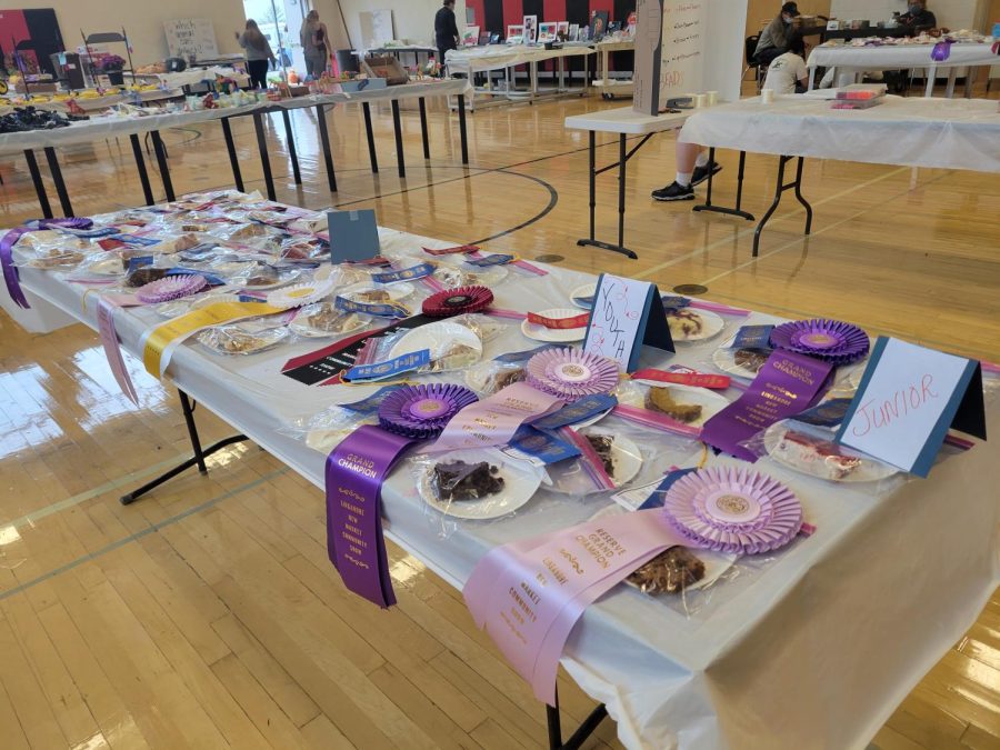 One of the many tables filled with delicious baked goods. This table features treats made by Youths and Juniors. 