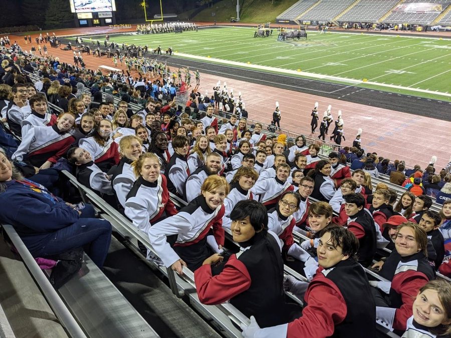 The marching band poses for a photo after their outstanding performance at the MMBA State Championships.